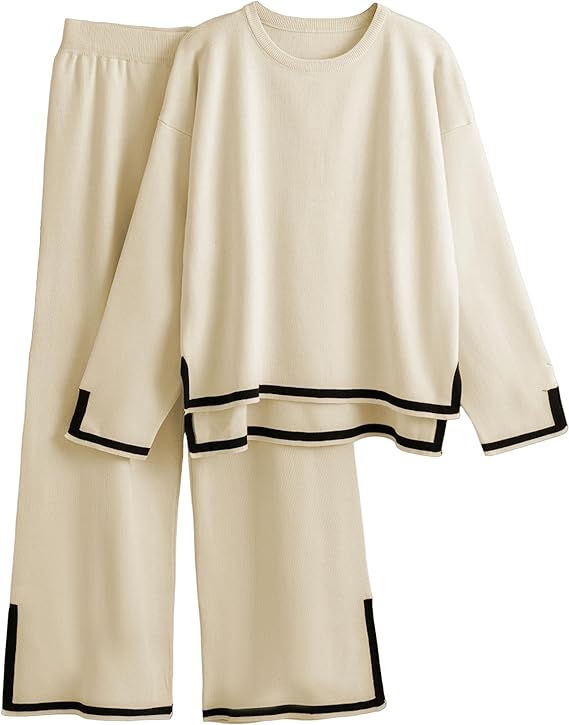 A women's cream sweater and pants set.