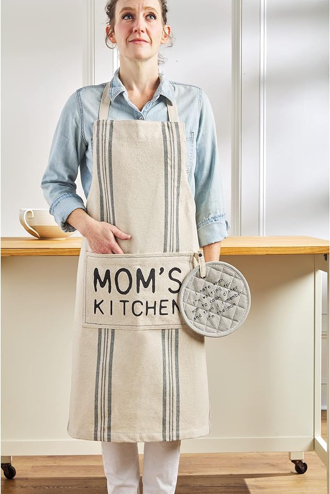 A woman wearing mom's kitchen apron.