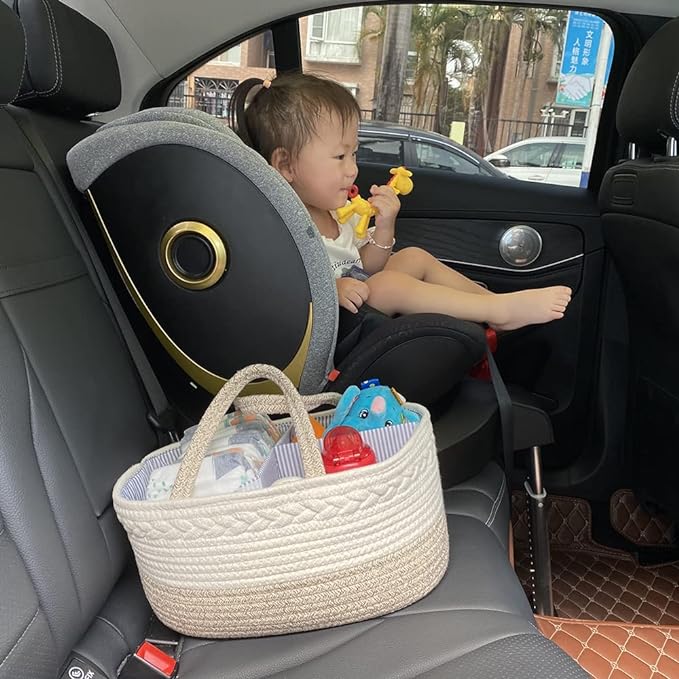 A child sitting in the back seat of a car with a basket, ready for a fun outing.