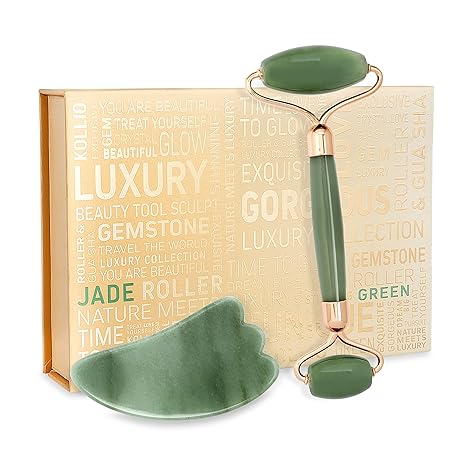 Jade roller and gua sha facial tools set with packaging.